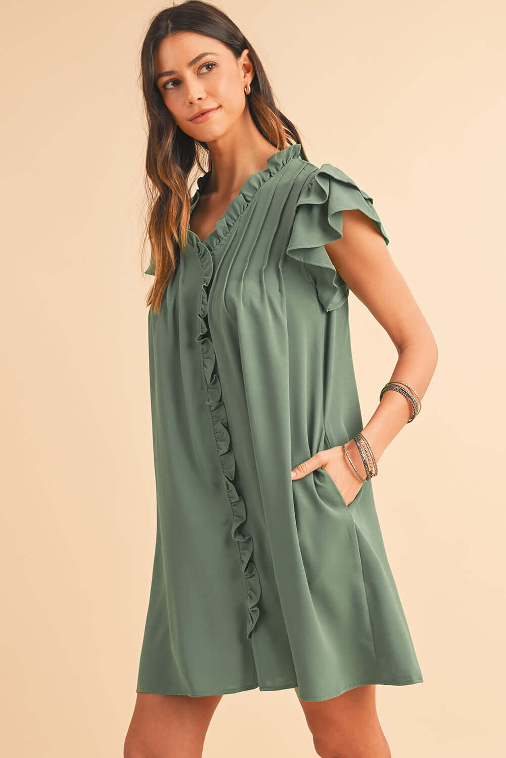 Ruffle Front Relaxed Fit Mini Dress. Side view.