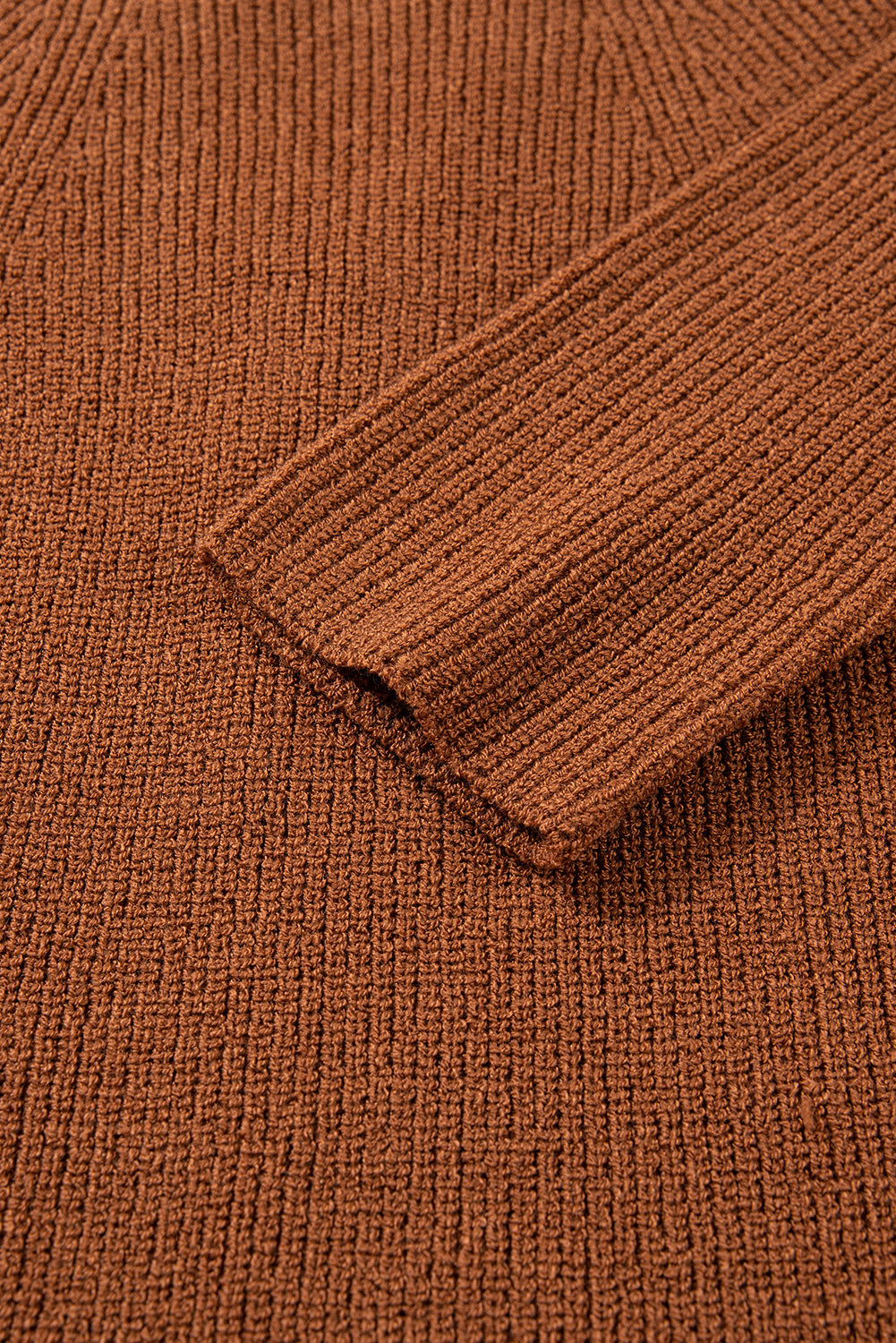 Close-up of a brown textured fabric with a folded edge