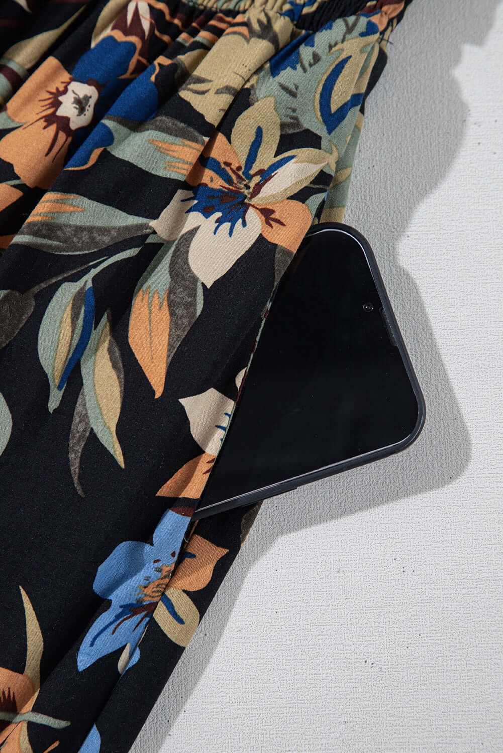 Relaxed fit boho floral pants with a wide-leg silhouette, perfect for travel and everyday wear.