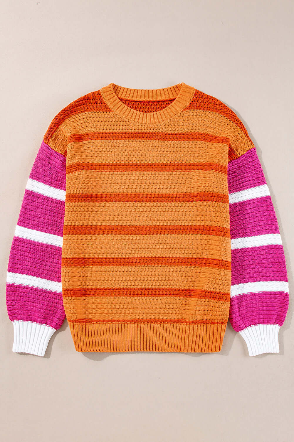 Chic and comfy drop shoulder jumper with bold colour stripes. Front view.