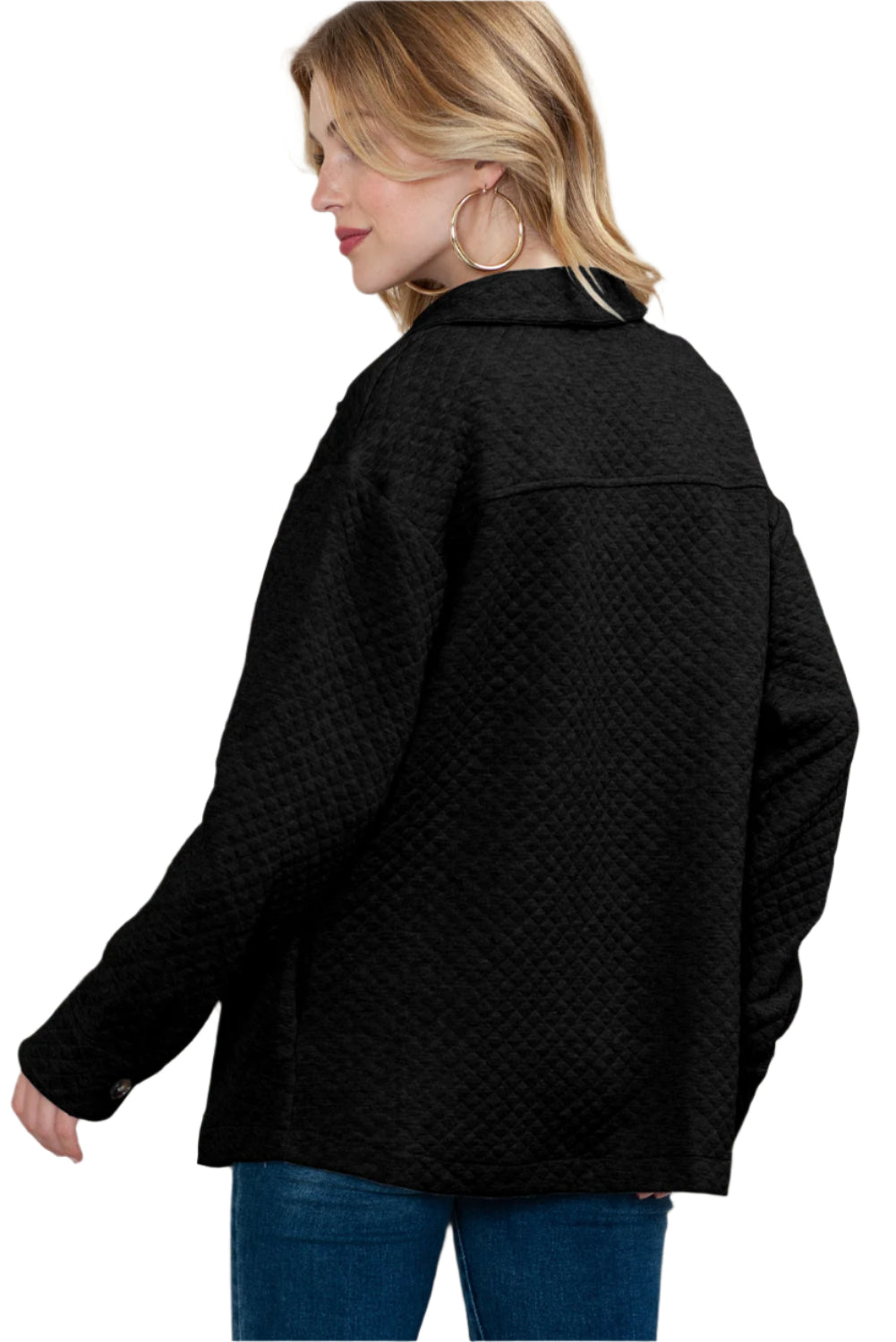 Back view of the quilted jacket, showing its sleek and flattering fit.