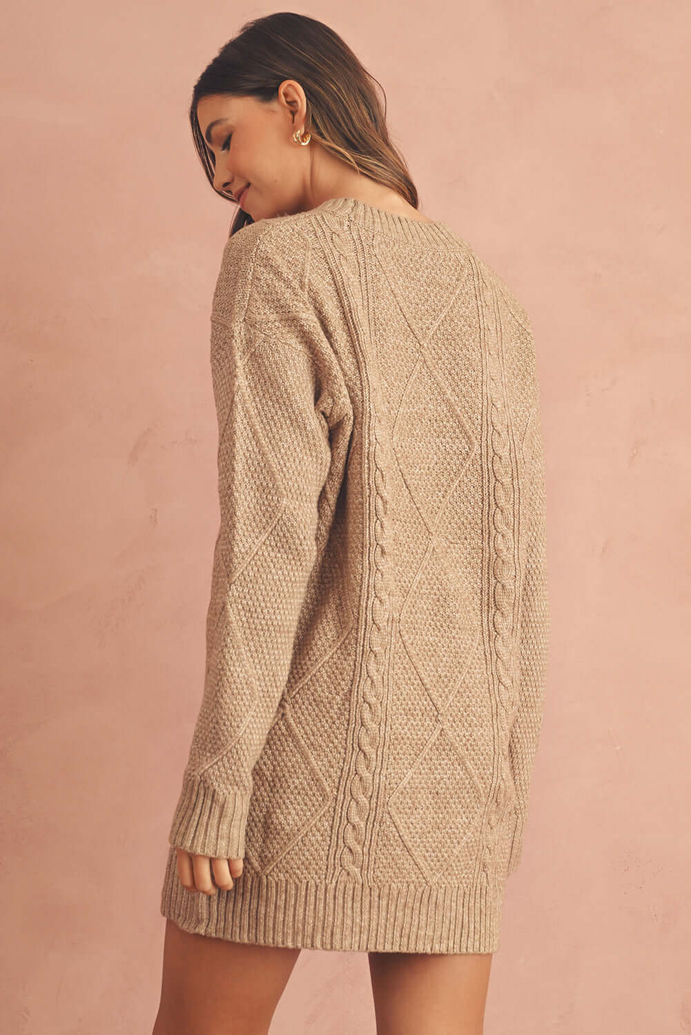 Women's Soft Beige Cable Knit Jumper Dress. Back view.