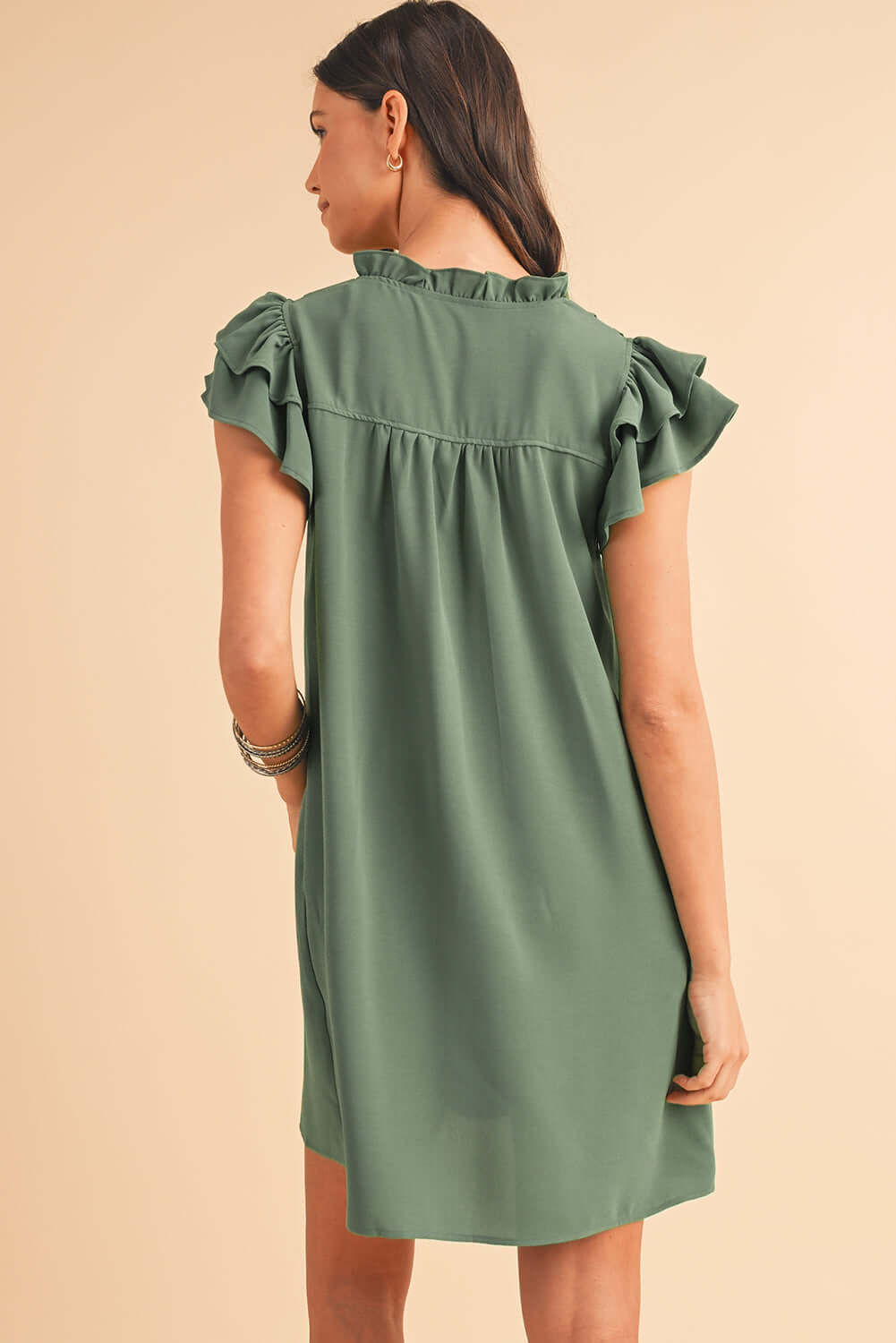 Ruffle Front Relaxed Fit Mini Dress. Back view.