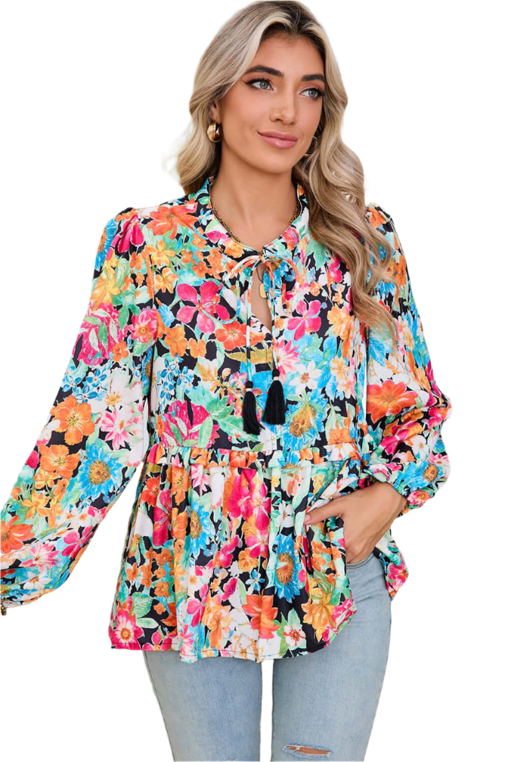 Front view of model wearing multicolour floral blouse with long lantern sleeves.