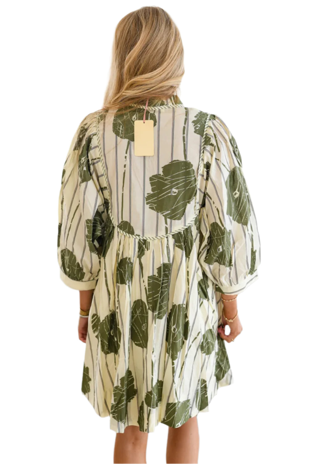 The back view of green abstract boho short dress, perfect choice for spring and summer seasons.