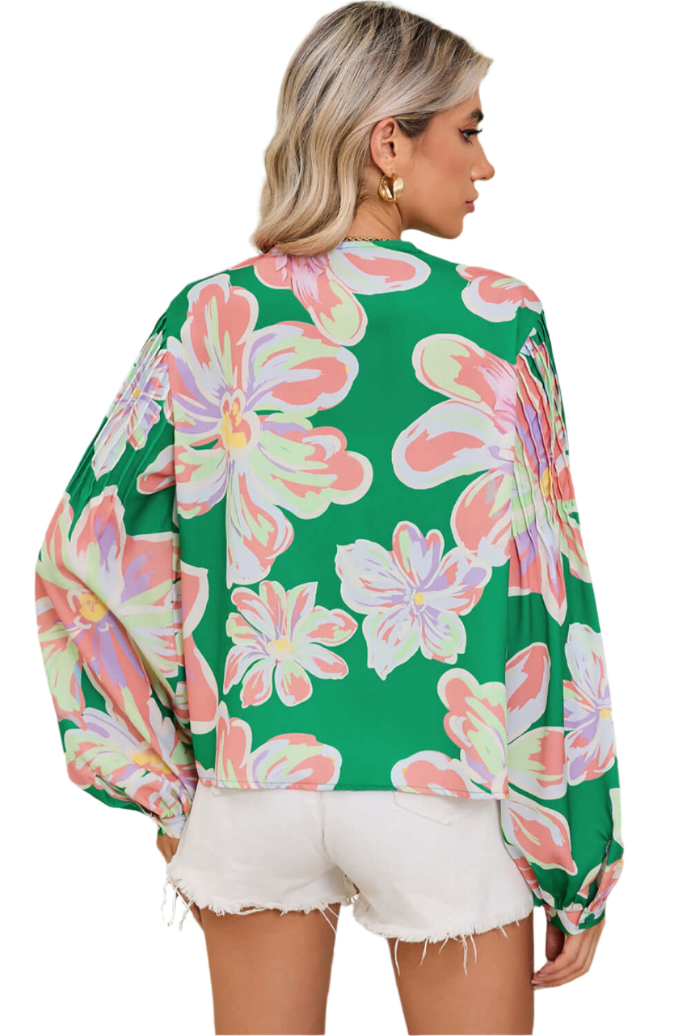 The back view of green floral blouse, featuring pleated long sleeves.