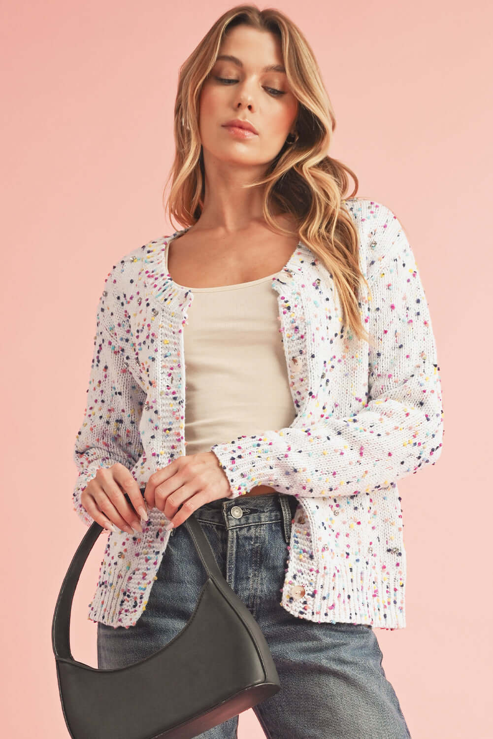 Chic white sparkle cardigan perfect for layering over casual and dressy outfits.