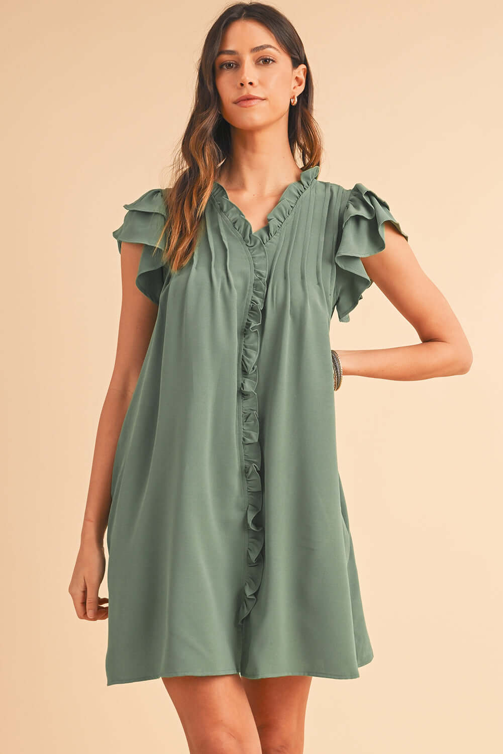 Ruffle Front Relaxed Fit Mini Dress. Full front view.
