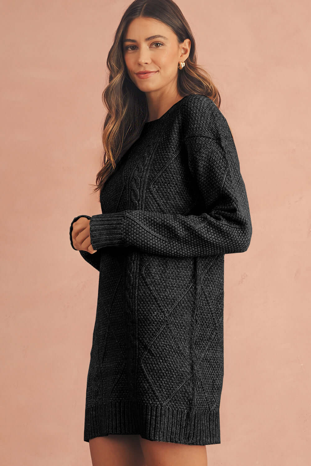 Women's Black Cable Knit Jumper Dress. Side view.
