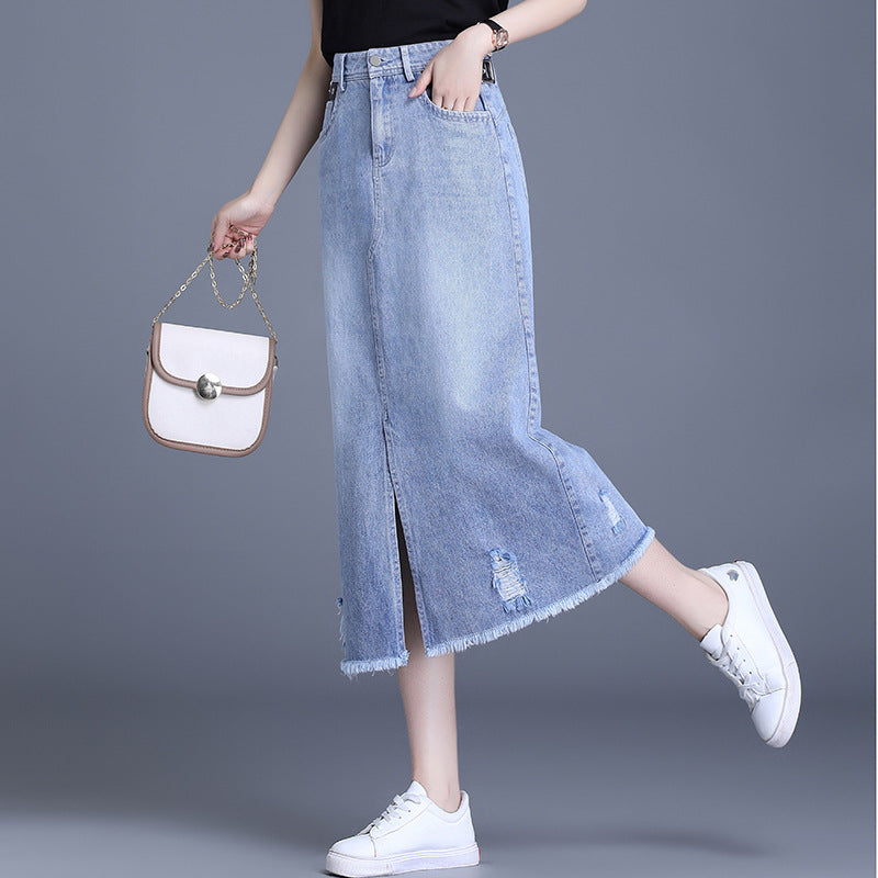 Korean Street Style Denim Midi Skirt - styled with white sneakers and trendy shoulder bag.