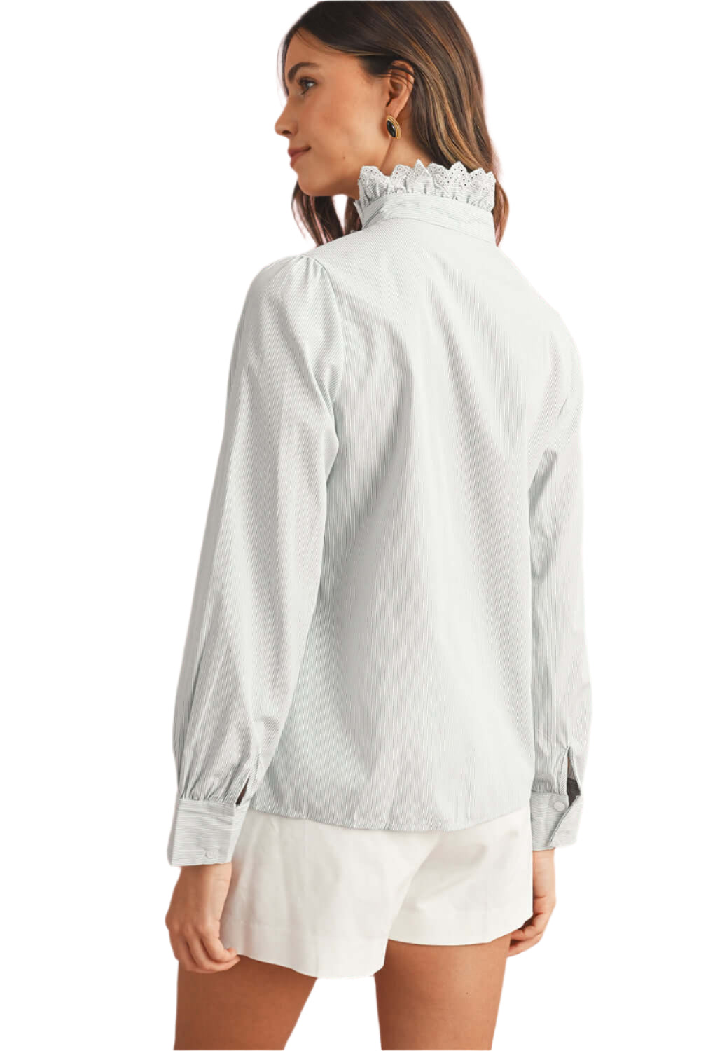 Back view of model wearing a blue striped shirt with lace trim details and long sleeves.