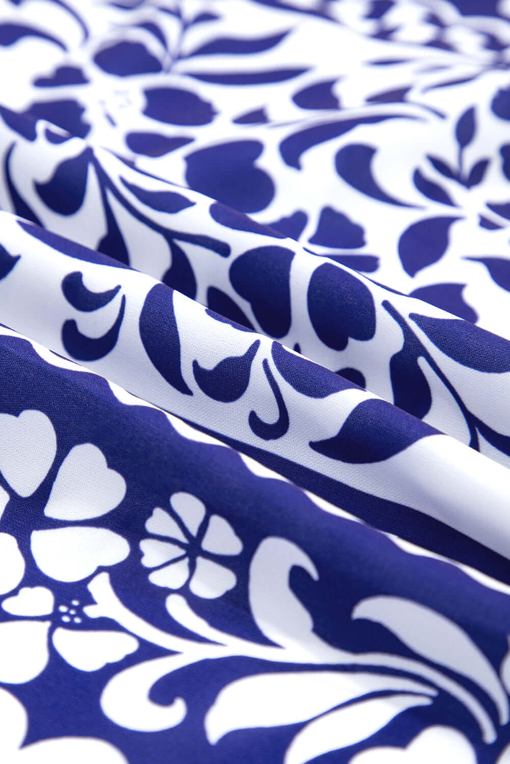 b27a3a6d784ccdafBlue & White Boho Print Midi Dress. Closed up fabric view.