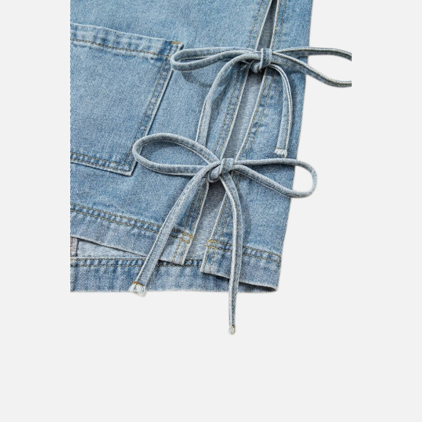 Light blue denim skirt with tied waistband on a white background
