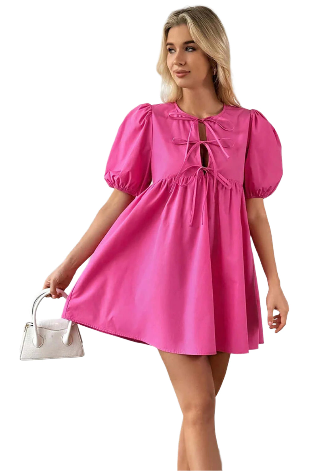 Bright pink puff sleeve mini dress with a tie-front detail, styled for a chic look, paired with a white handbag. Available at Catherine Martin store, Australia.