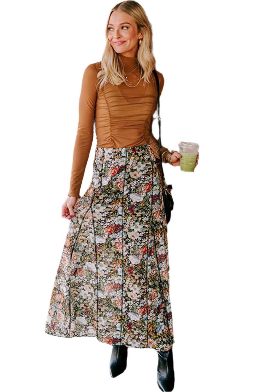 A woman wearing a brown floral bohemian maxi skirt with a straight leg style, outdoors, ideal for casual summer occasions.