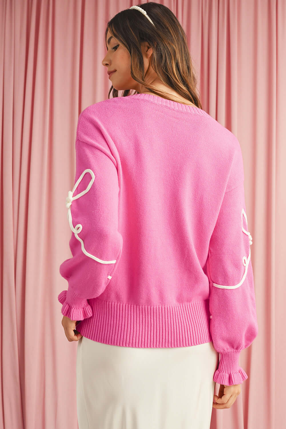 Soft pink jumper with bow, Australian fashion.