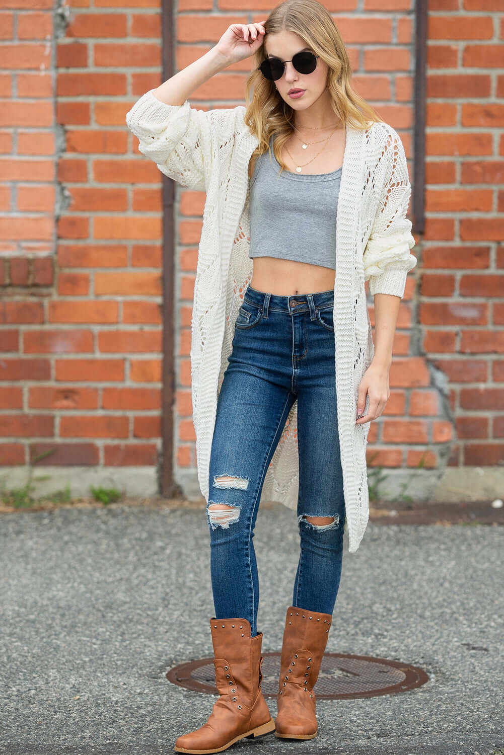 Breezy and stylish crochet cardigan paired with denim for a relaxed Aussie vibe.