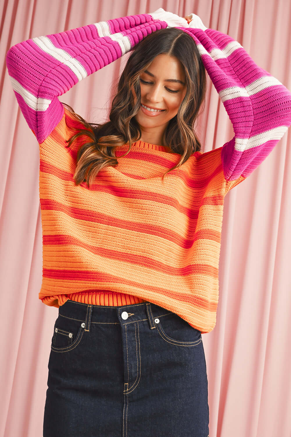Bright and cosy drop shoulder knit jumper with bold stripes.