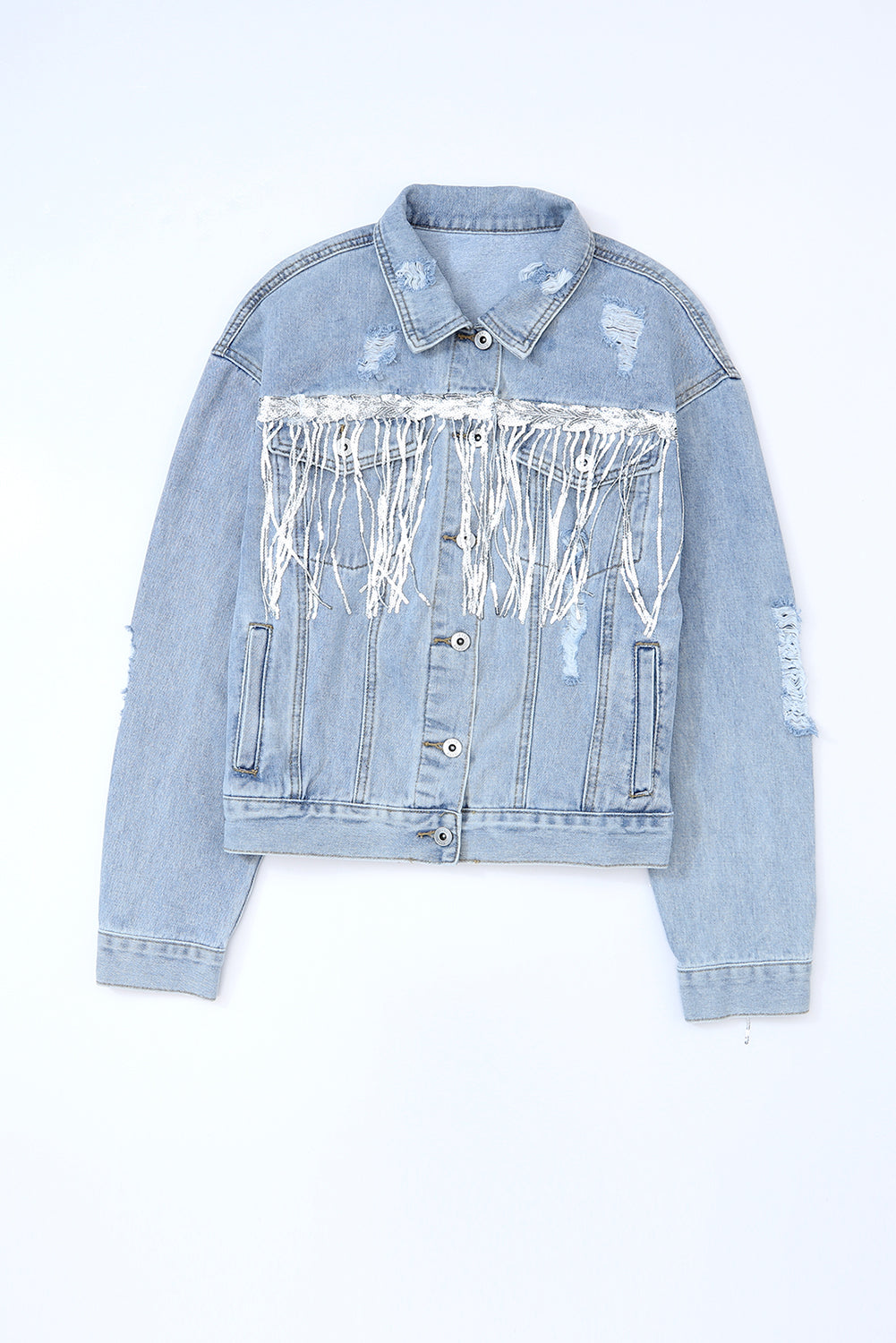 Light blue denim jacket with white sequin panel on a light blue background