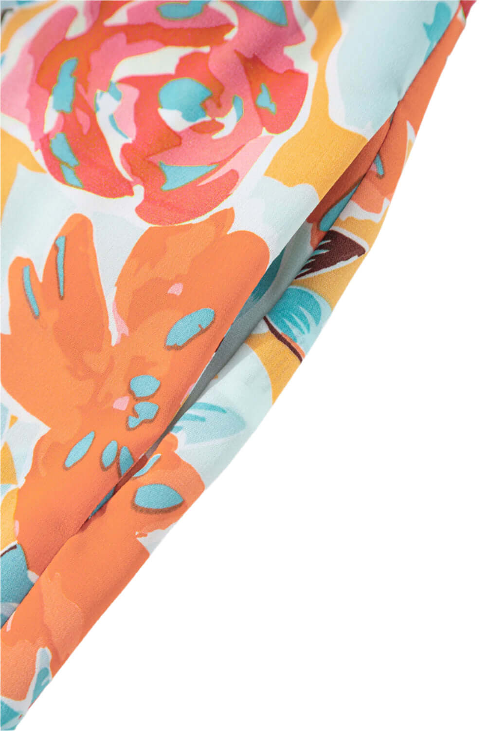 Lightweight and vibrant floral co-ord set for a chic, effortless summer look. Pocket view.
