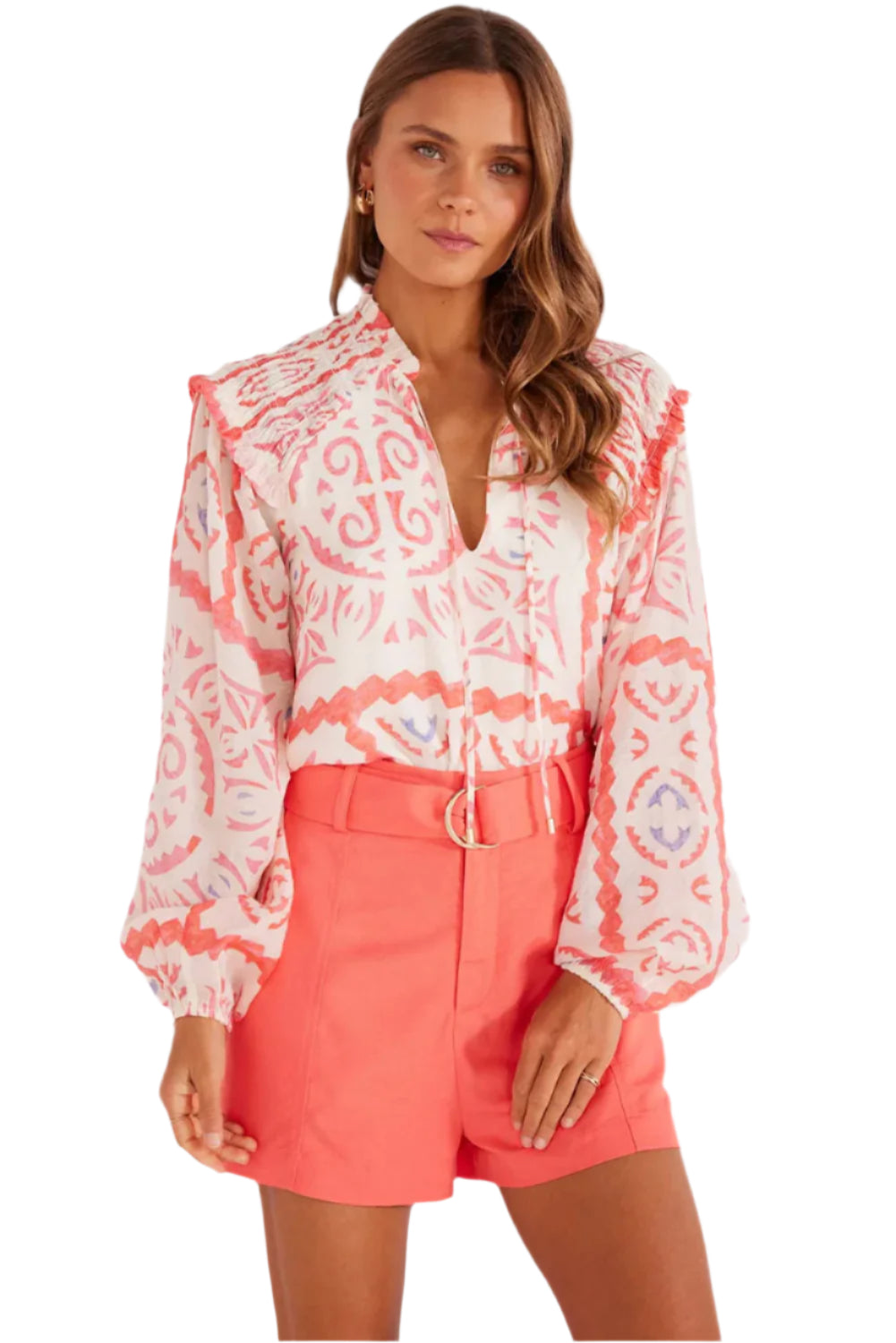 Women wearing a light orange abstract print with puff sleeves, perfect for special occasions.