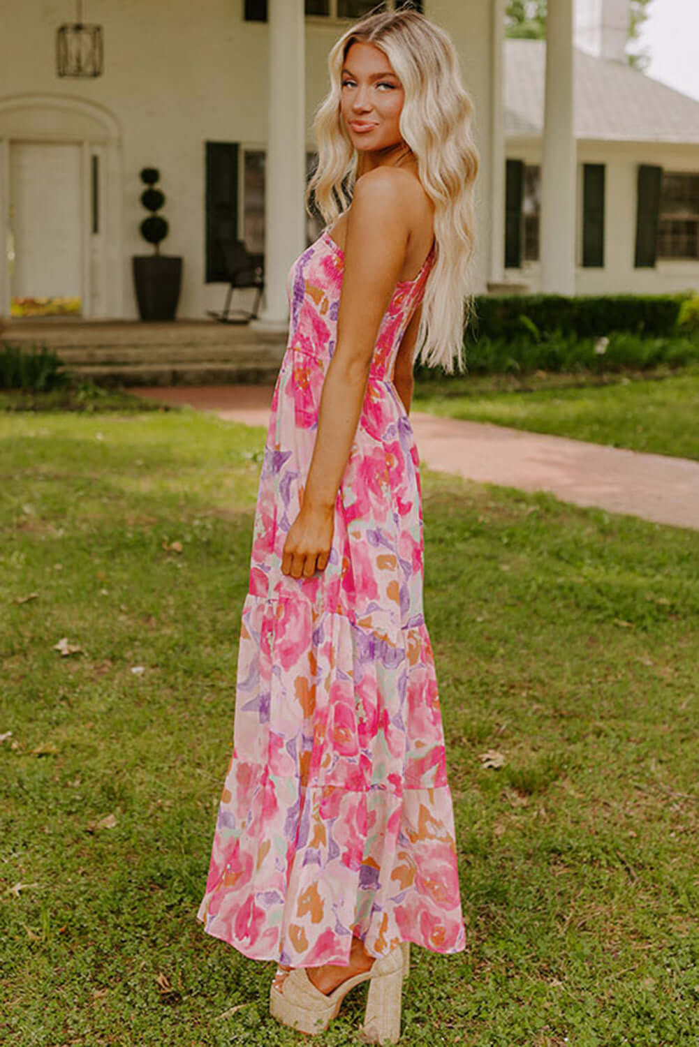 Rosy Sunset One-Shoulder Dress. Side view. Outdoor setting.
