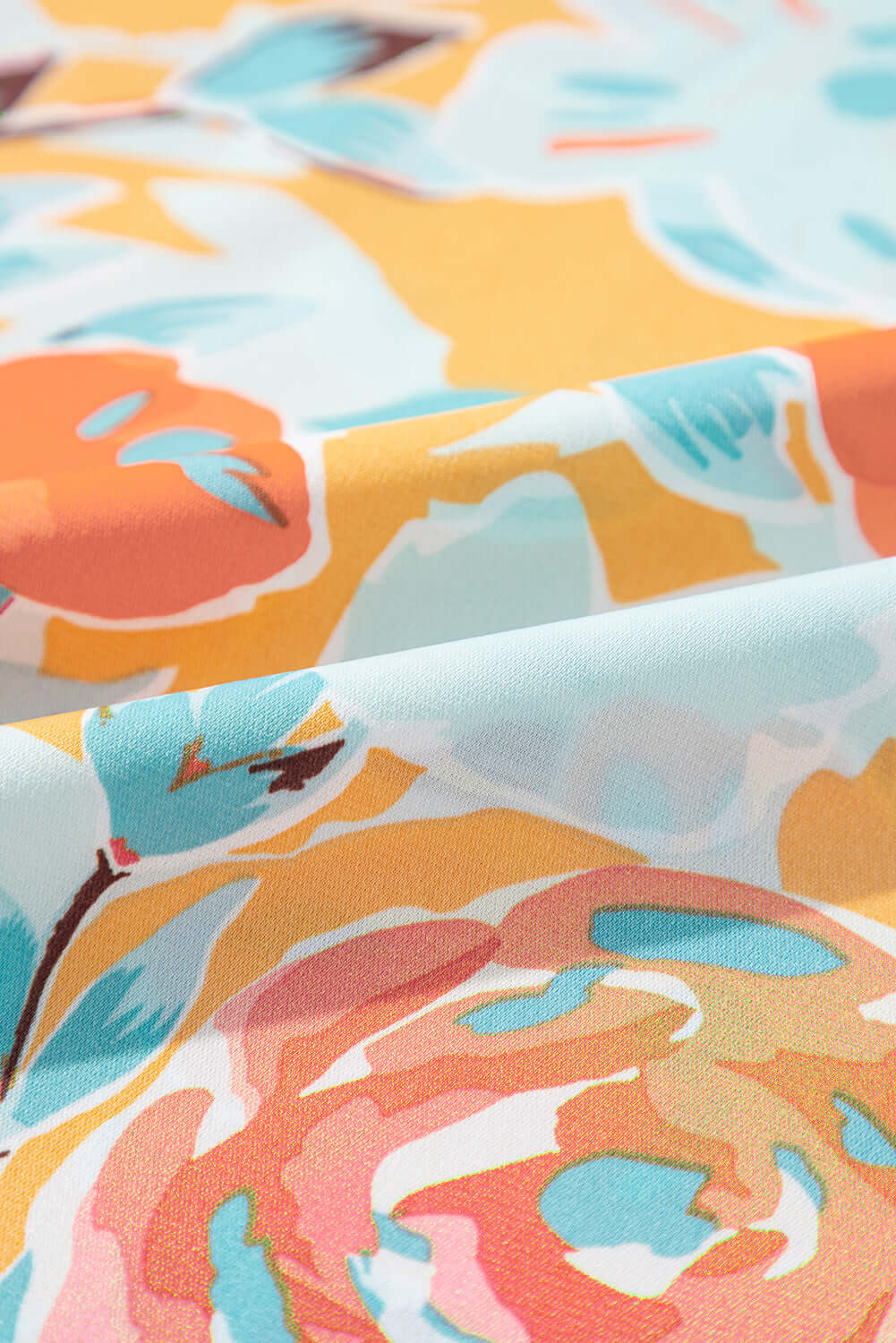 Flowy and breathable floral outfit, designed for comfort and style in warm weather. Fabric view.