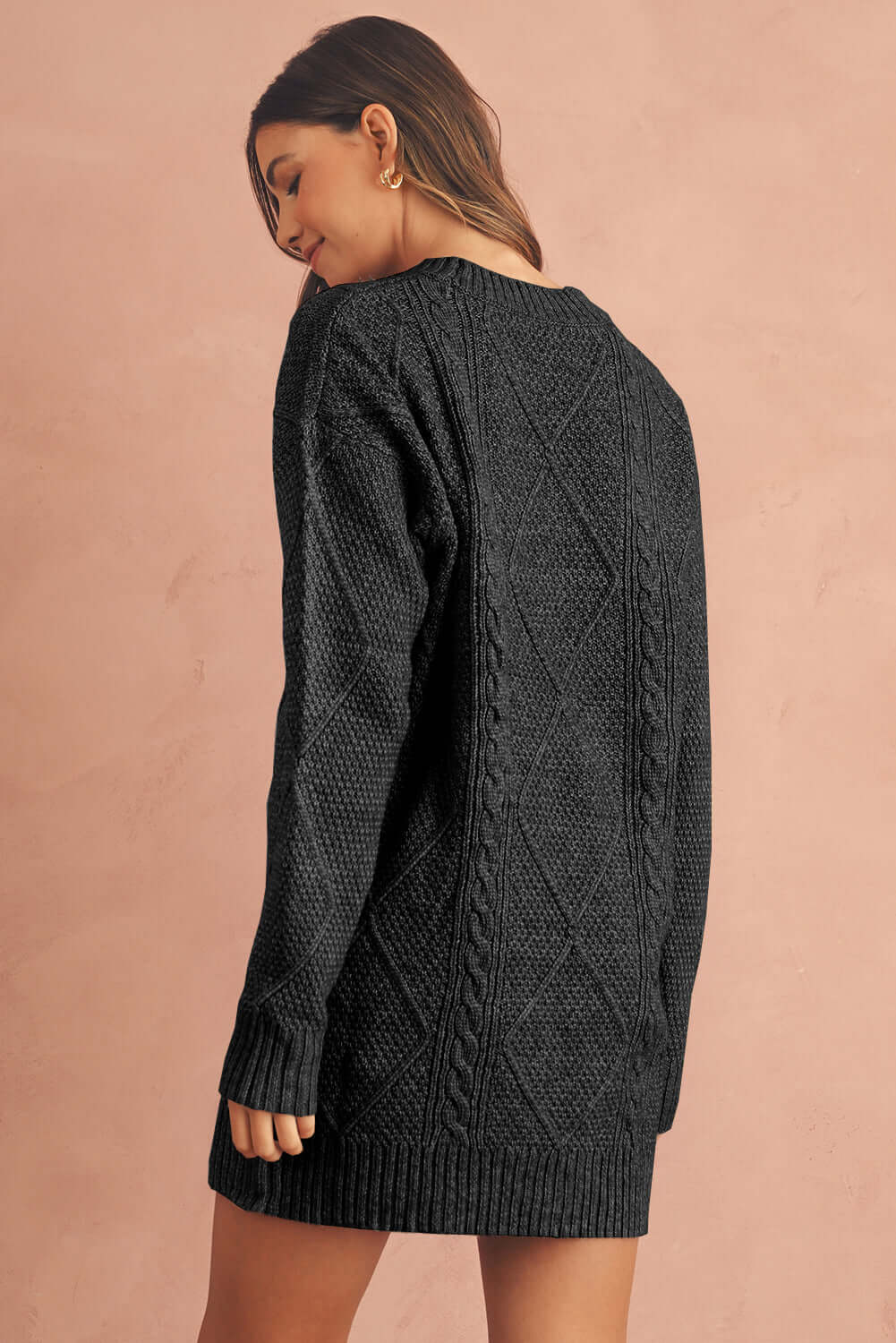 Women's Black Cable Knit Jumper Dress. Back view.