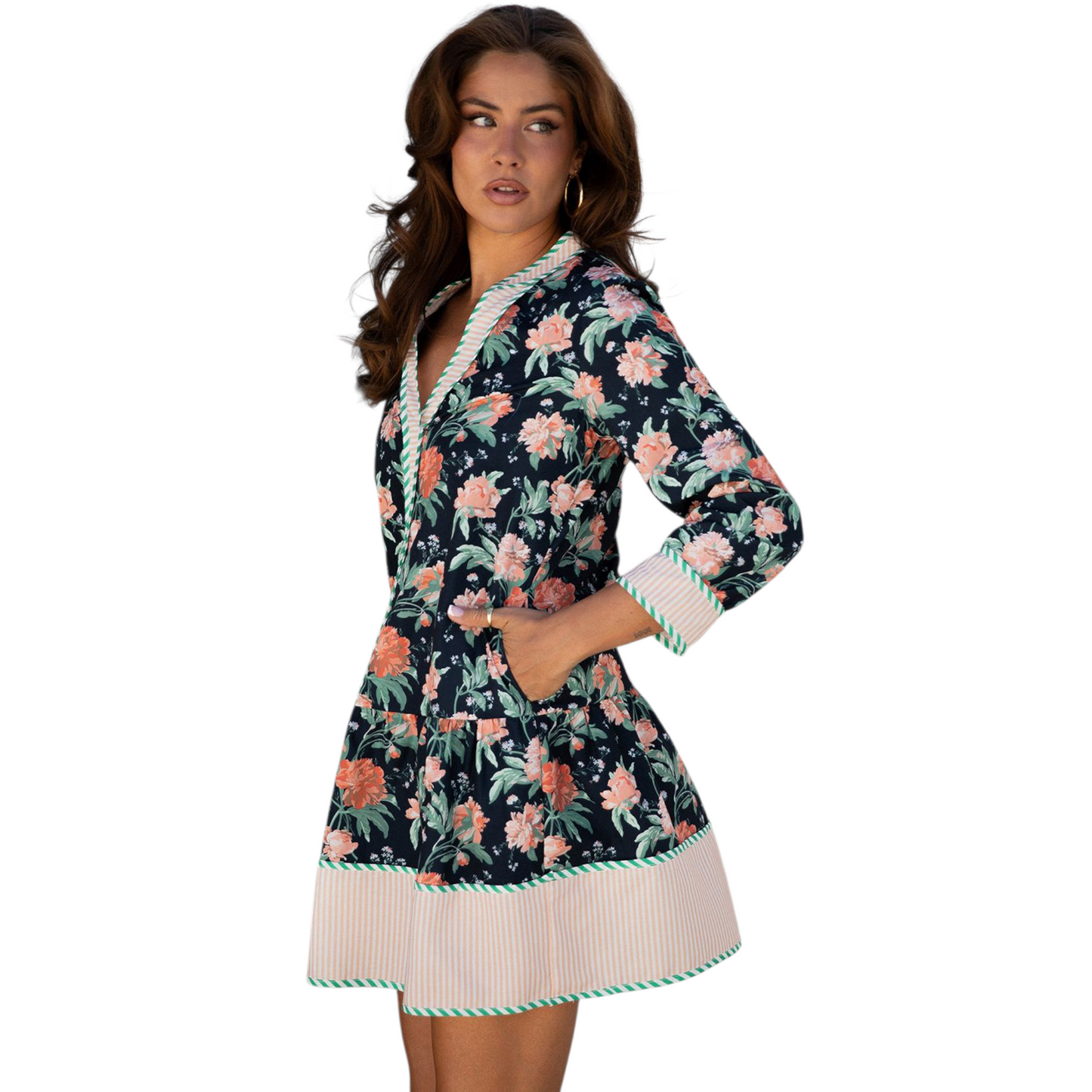 Woman wearing a floral dress with a white background