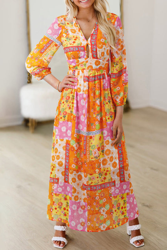Woman wearing a colorful floral dress indoors