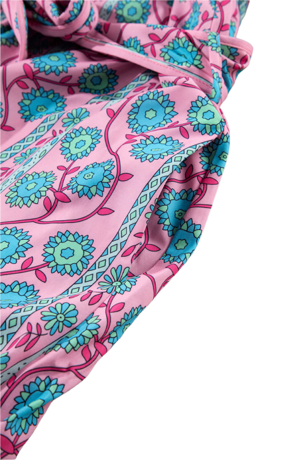 Pocket view of a pink floral boho belted maxi dress with shirred short sleeves, ideal for summer events and casual outings.