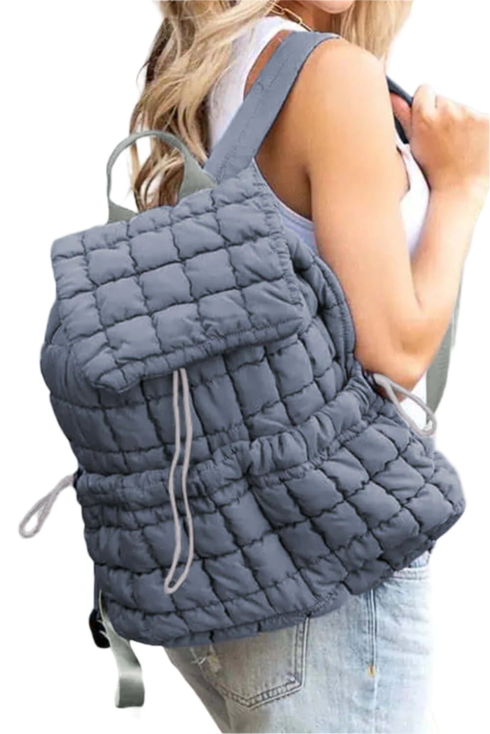 Blue quilted puffer backpack for women.