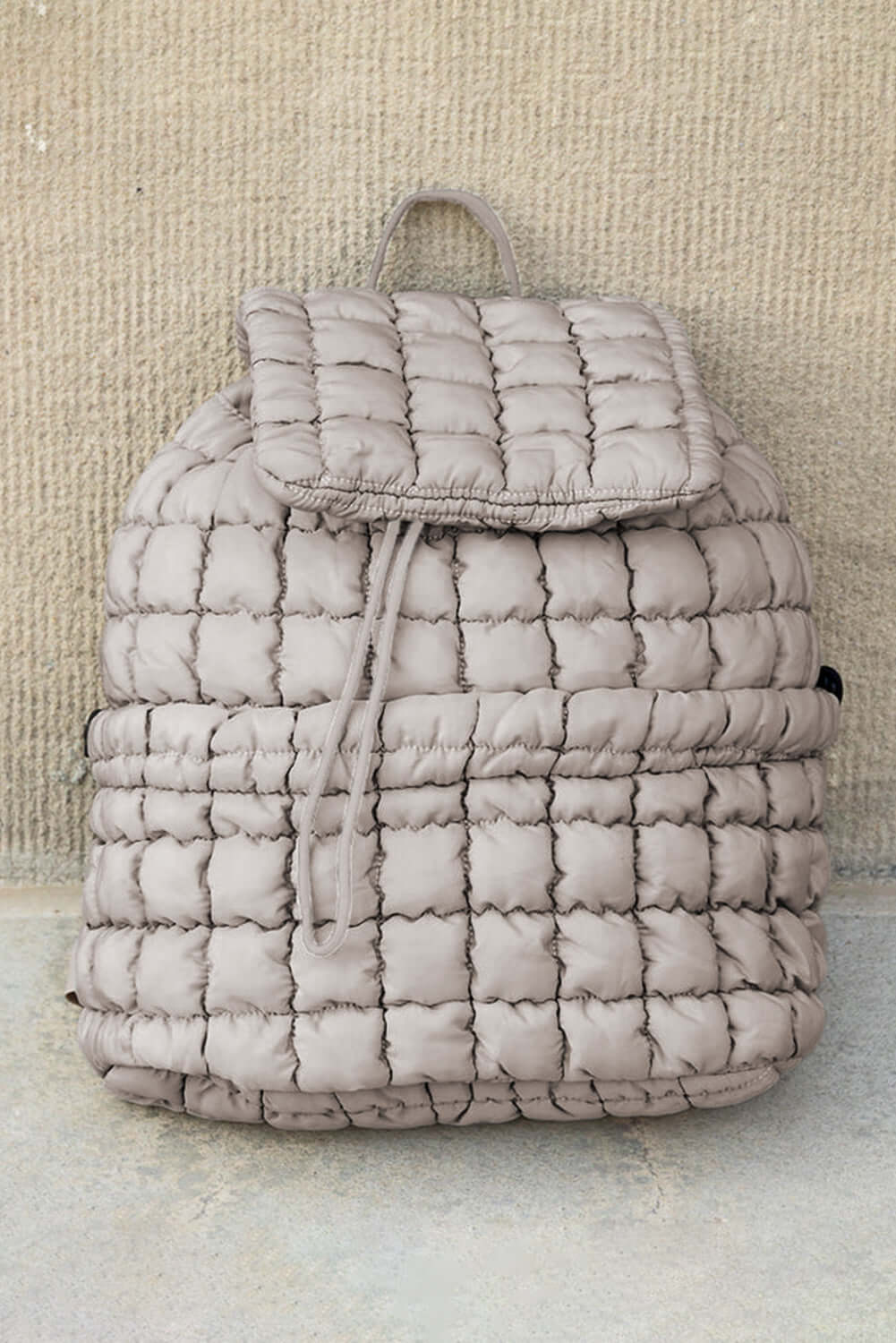 Lightweight quilted puffer backpack for ladies.