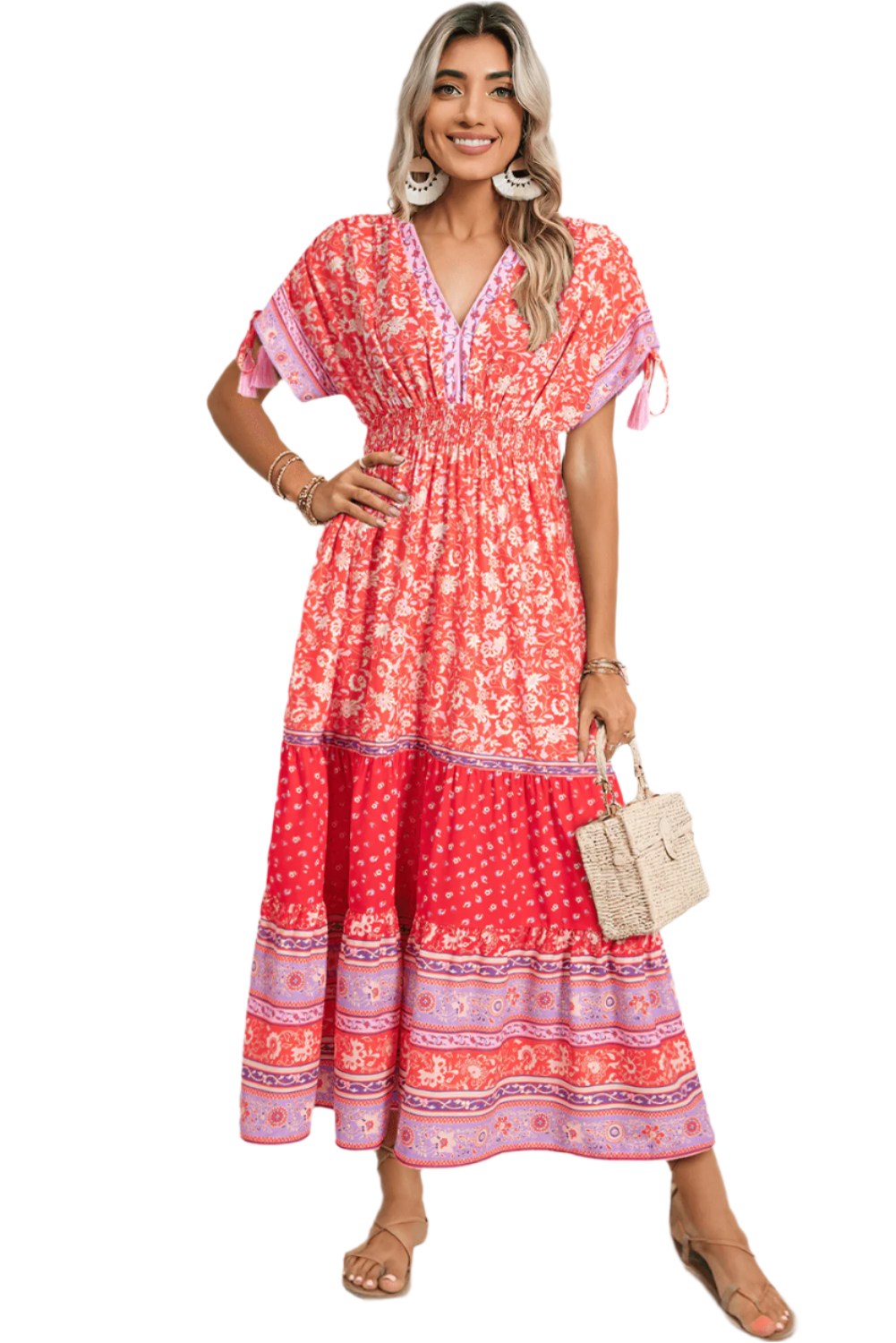 Woman wearing a red boho floral maxi dress with tie sleeves, perfect for casual summer occasions.