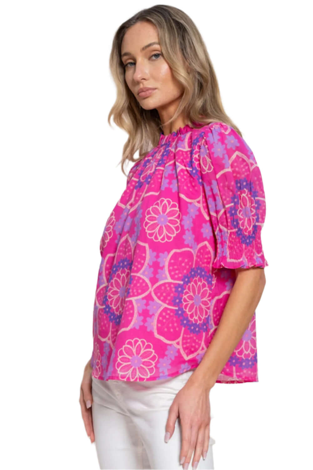 Feminine floral blouse with romantic frill details.