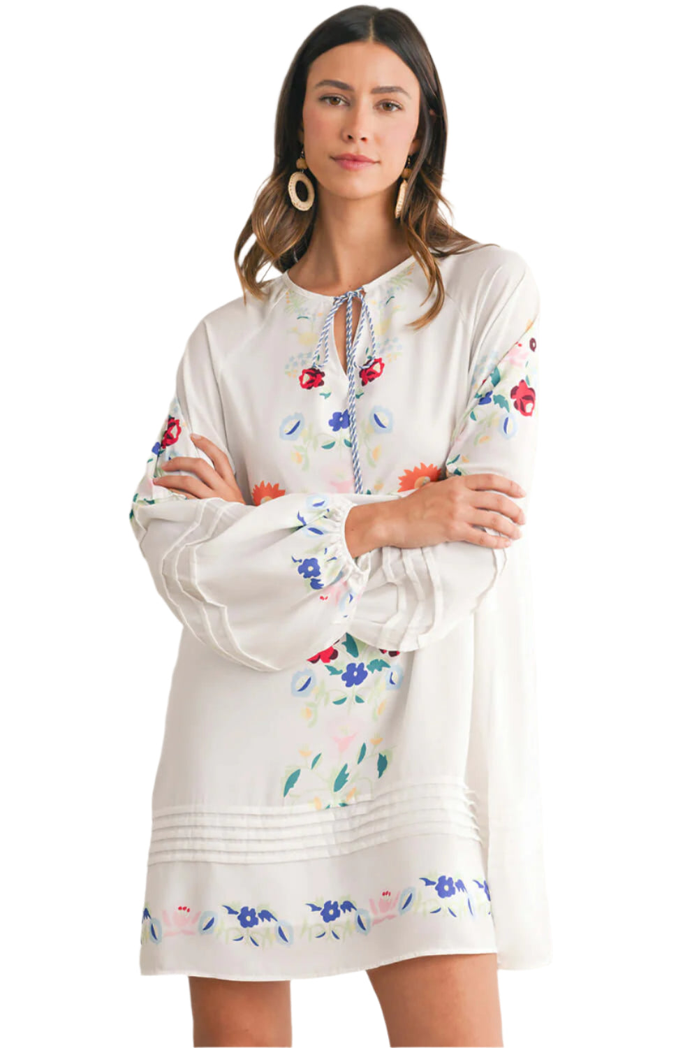 White short dress for women, featured with tassel tie neckline and floral embroidery.