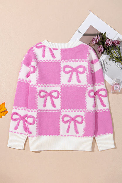 Aesthetic pink check sweater for women, stylish and cozy knitwear.

