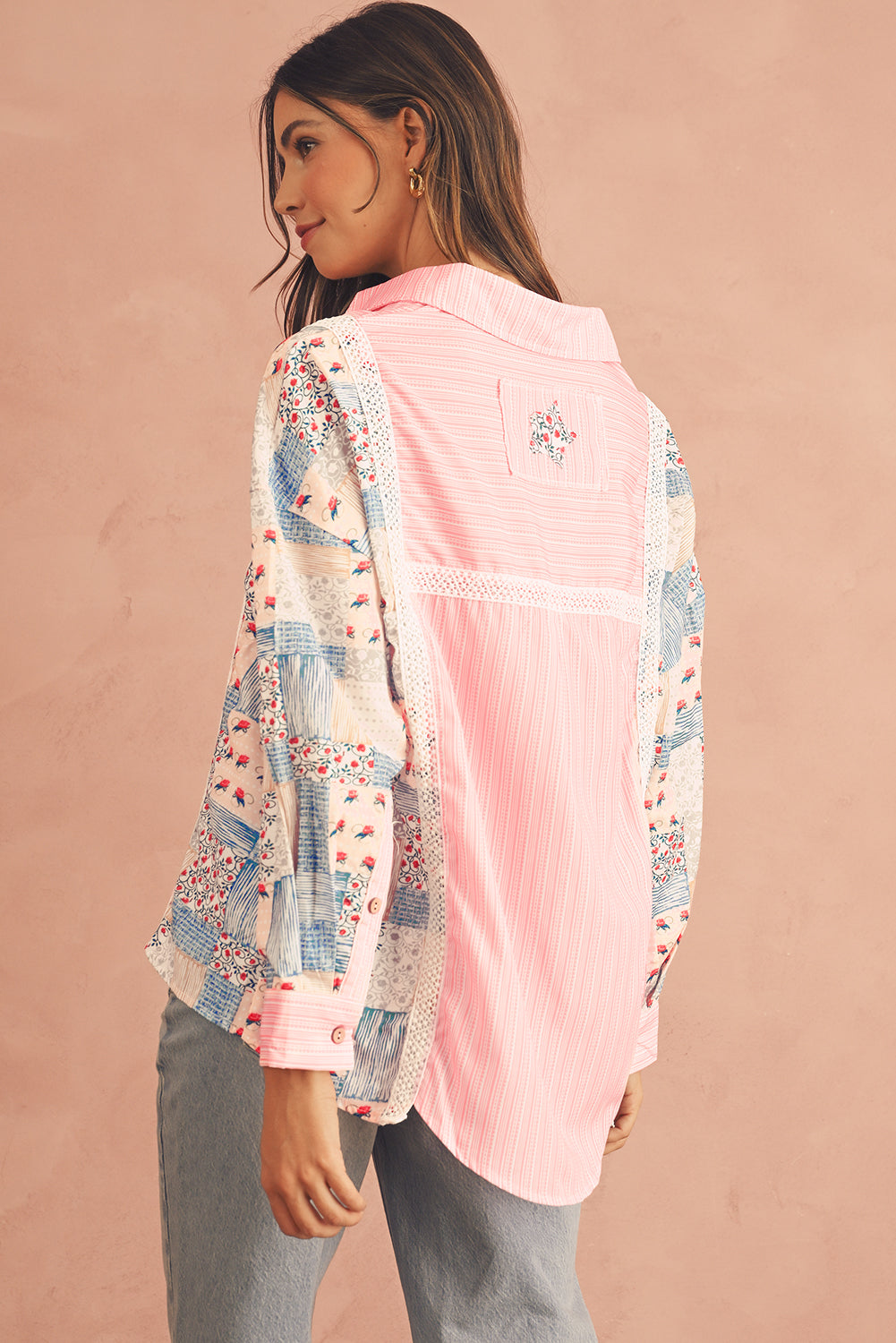 Back view of a pink floral patchwork long sleeve shirt.