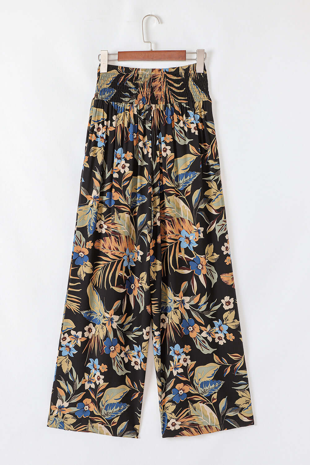 Trendy wide-leg summer pants with an elastic shirred waist, great for casual or resort wear.
