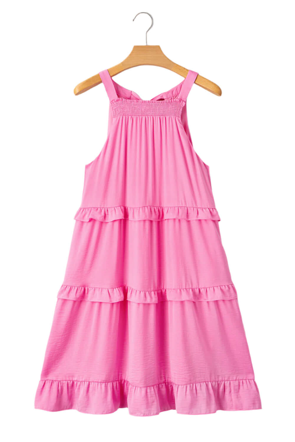 Feminine and breezy pink ruffle dress, ideal for festivals, beach days, or casual outings.

