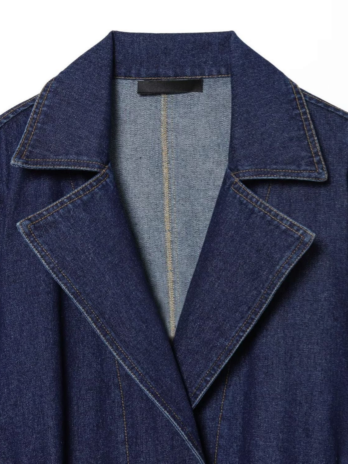 Catherine Martin dark blue denim coat with a wide notched collar and structured lapels in a denim-polyester blend.