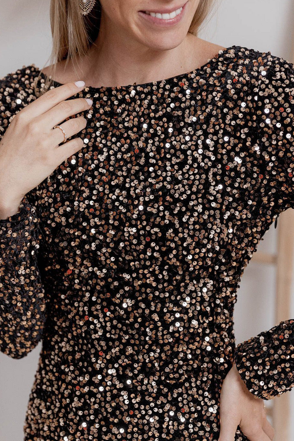 Close-up view of Chestnut bodycon sequin mini dress with long sleeves, worn by a model, by Catherine Martin, Australia – chic, figure-hugging design ideal for evening wear.