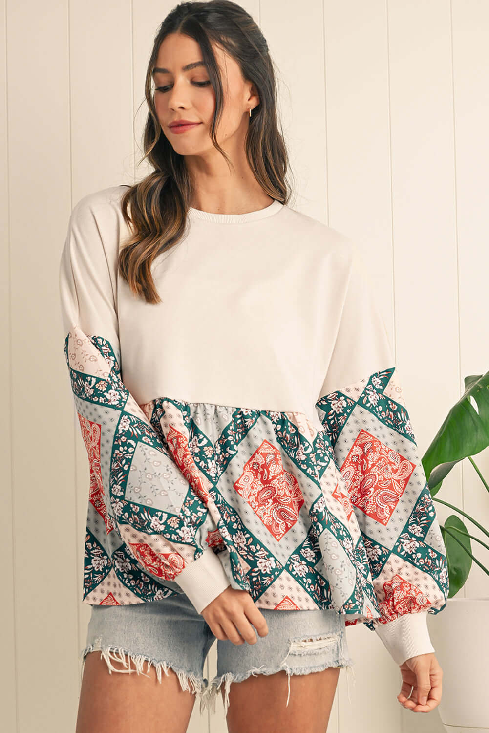 Boho chic patchwork jumper with a relaxed fit, great for layering and everyday wear.