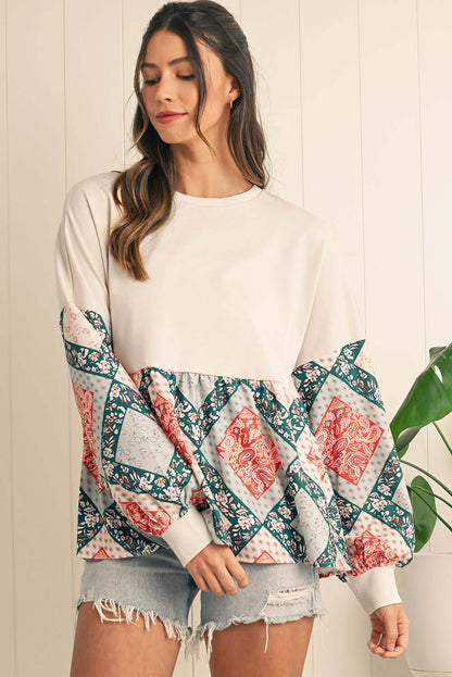 Boho chic patchwork jumper with a relaxed fit, great for layering and everyday wear.