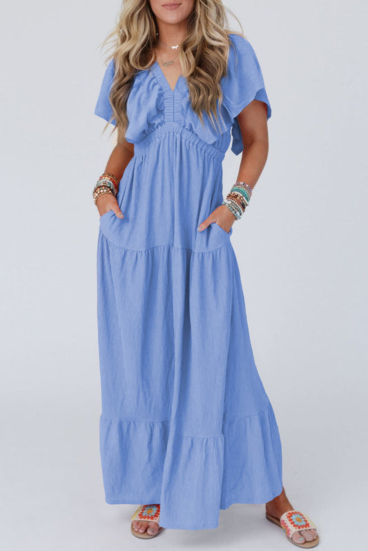 Flowy Boho Maxi Dress With Sleeves-Sky Blue colour. Front view.