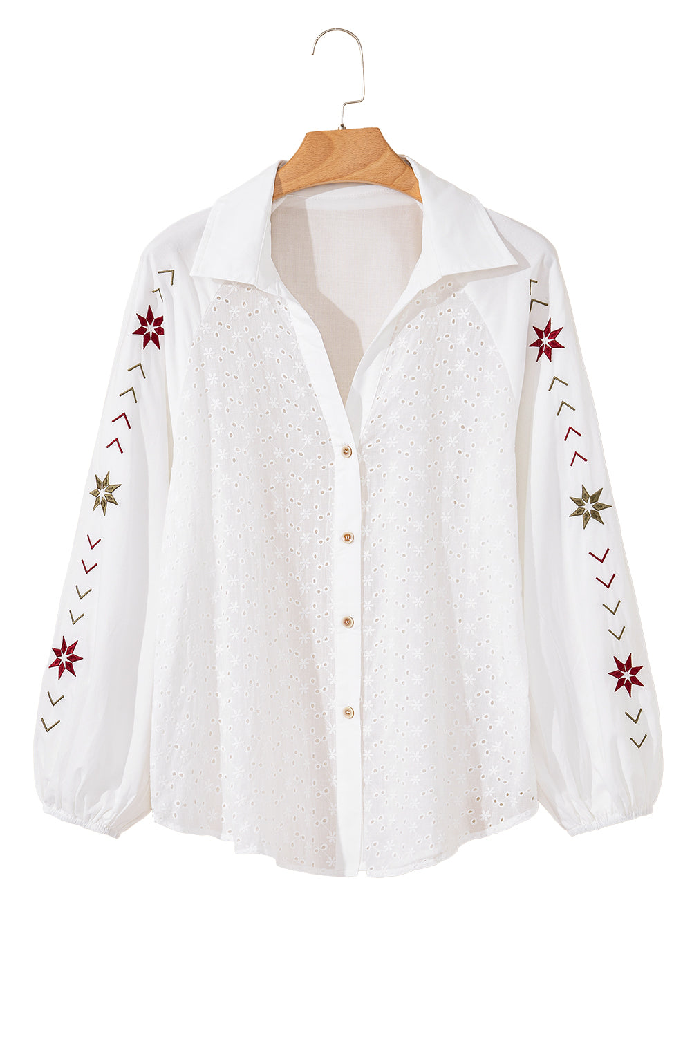 The front view of the white embroidered shirt showcases its puff long sleeves against a white background.