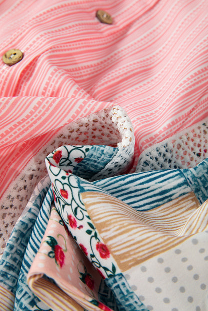 Close-up view of the fabric on a pink floral patchwork long sleeve shirt.