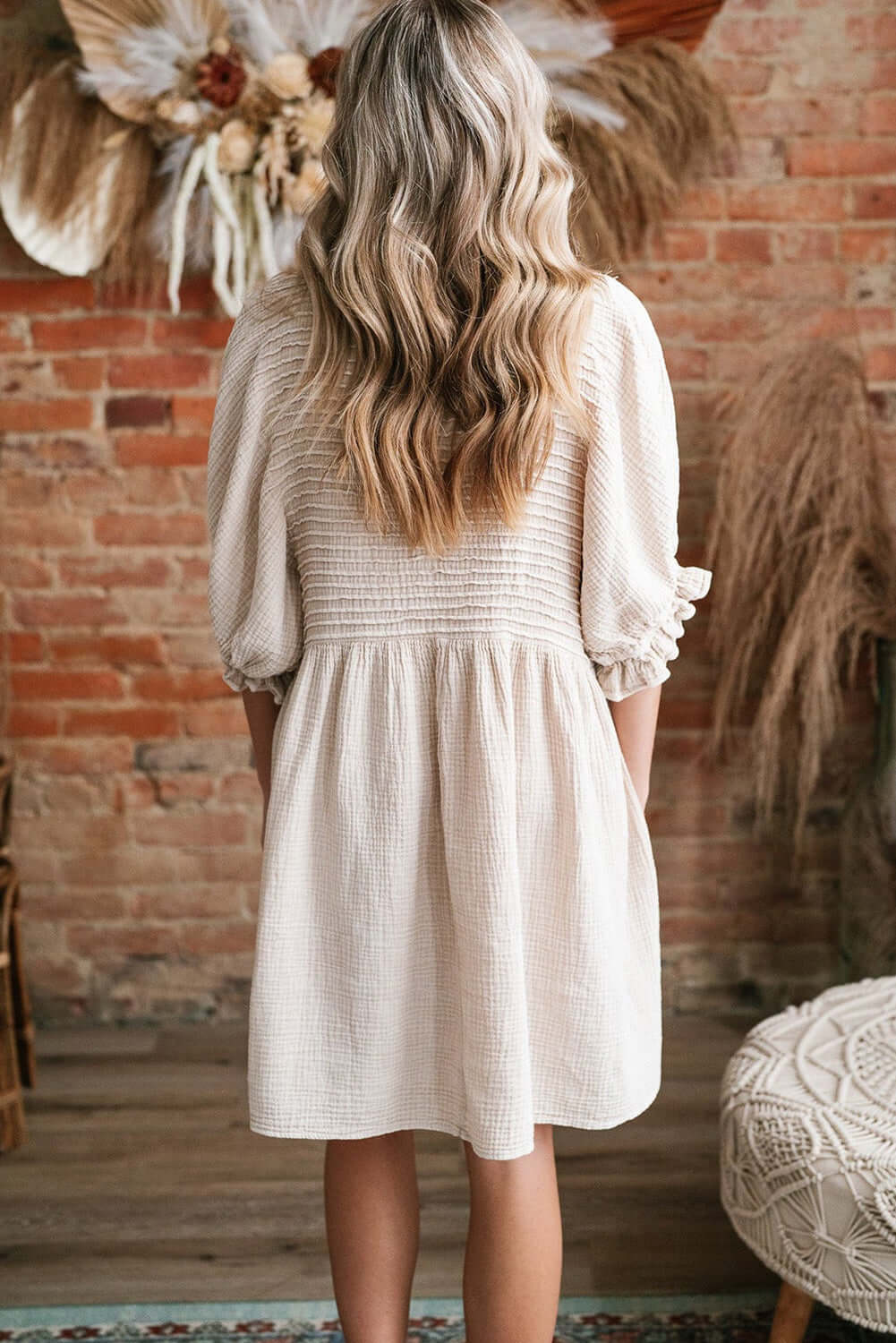 Cute Neutral Tone Loose Dress with Sleeves. Back view.