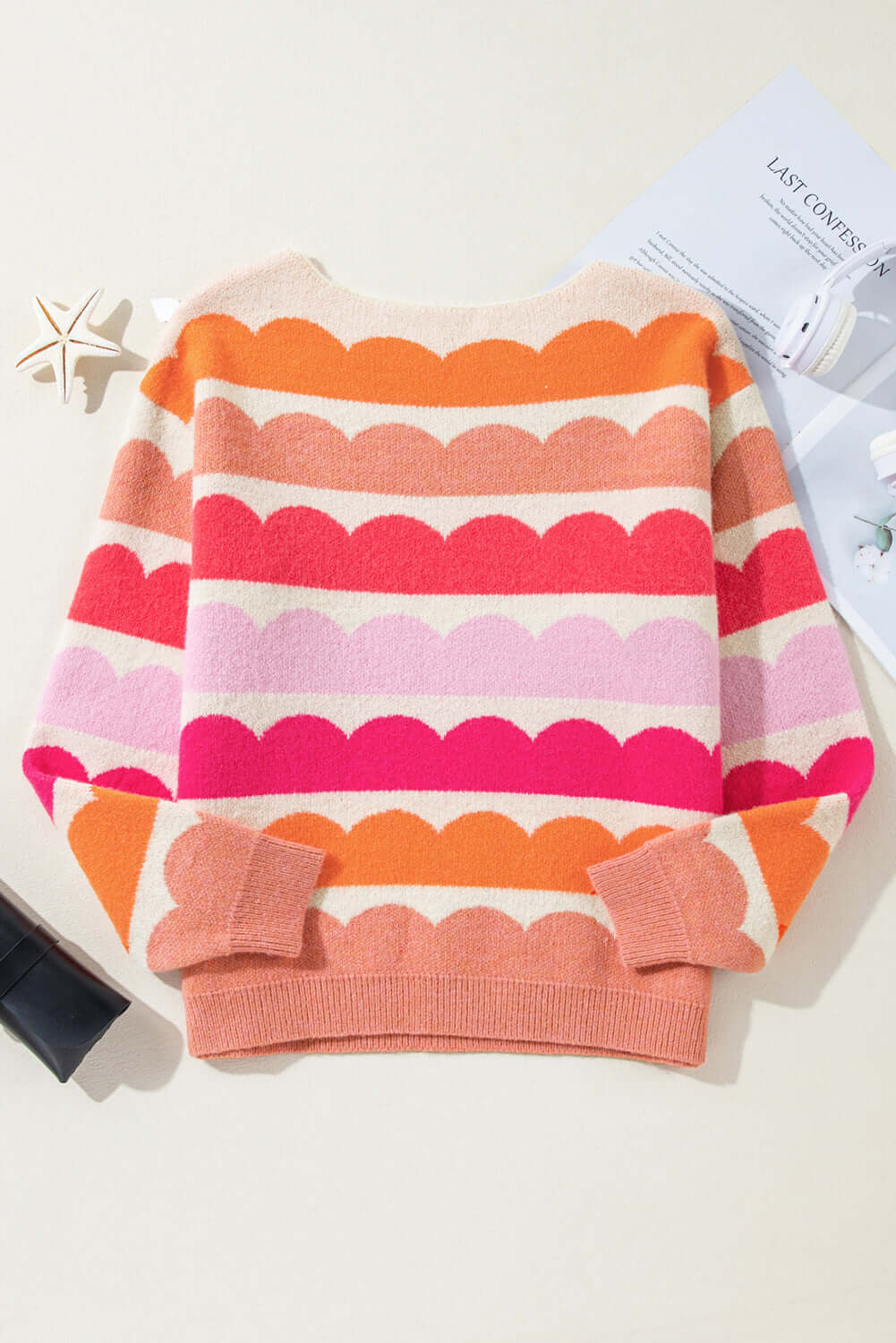 Women's Rose Red Striped Jumper. Back view, flat lay.