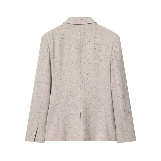 The rear view of the khaki speckled blazer showcasing the structured tailoring and the classic center-back vent.